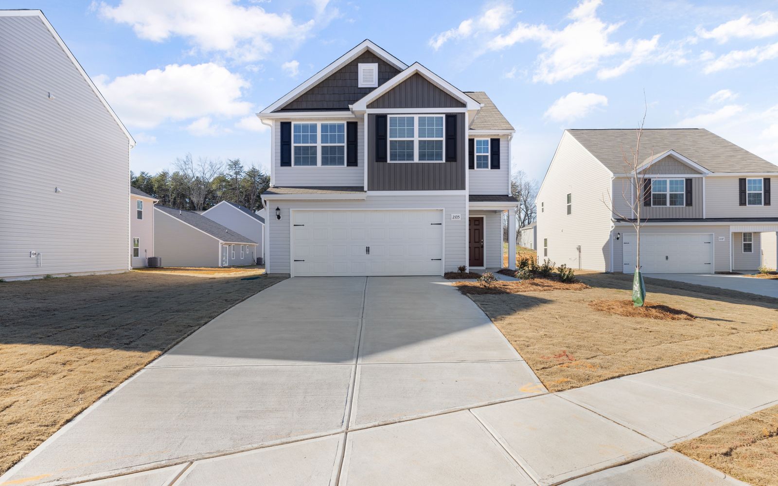 Clean, freshly pressure washed concrete driveway